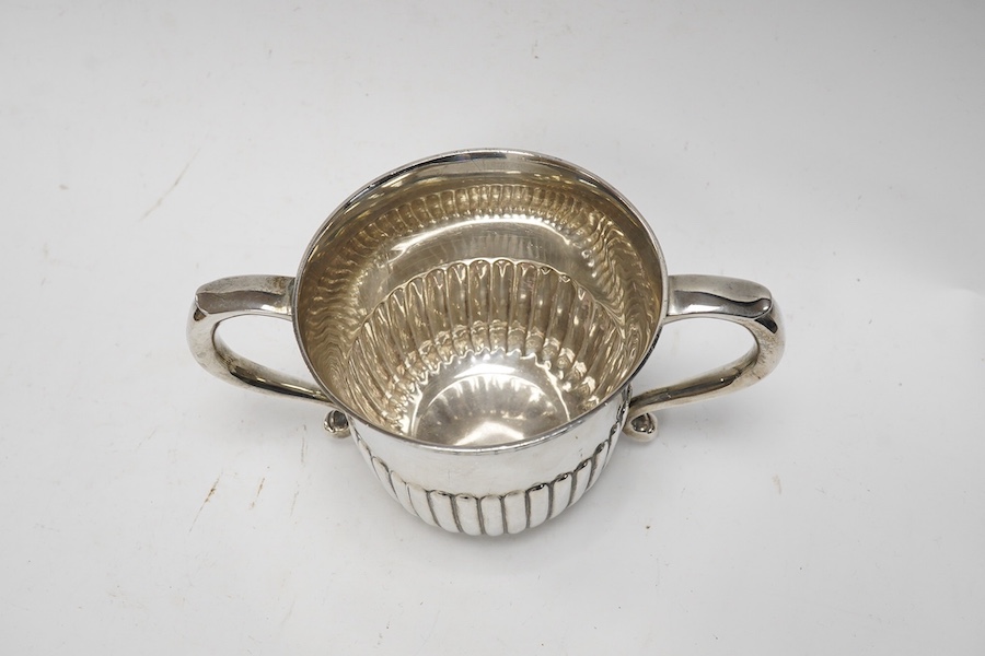 A George V demi-fluted silver porringer, Wilson & Sharp, London 1912, height 82mm, 8.6oz. Condition - good